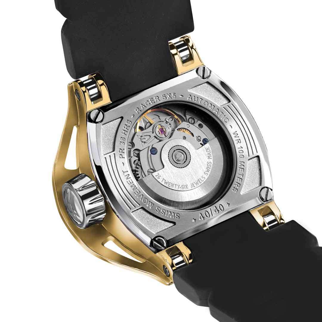 back of a mens gold automatic watch with sapphire crystal to see the movement