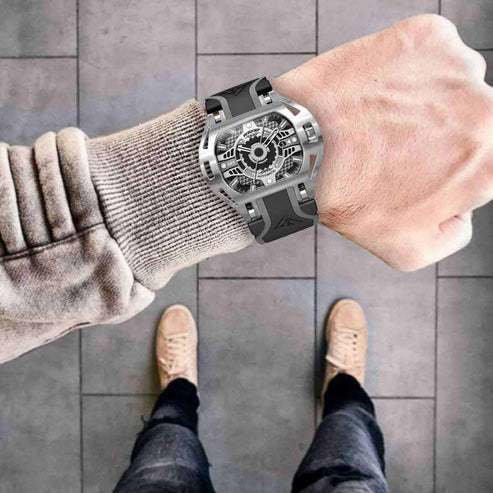 man wearing a swiss self winding watch wryst