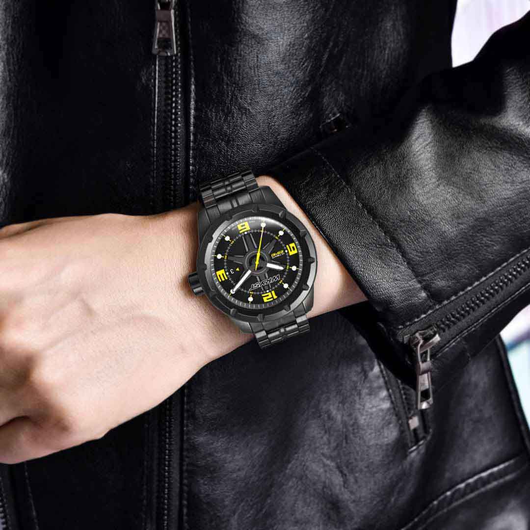 Man wearing the black dial watch Wryst ES40