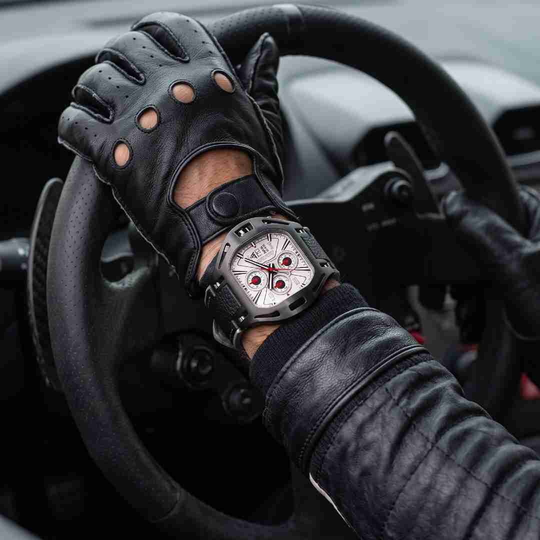 Men wearing the Wryst Motors PS620-B watch with leather jacket and gloves inside a sports car