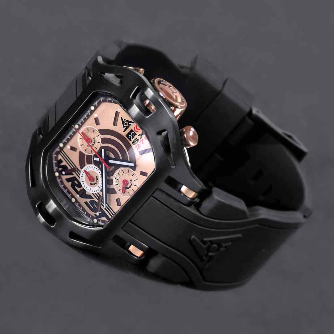 photography of a black watch with rose gold details